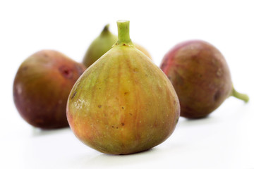 Fresh figs on white