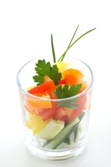 fresh salad with tomatoes, cucumber in glass