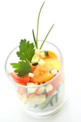 fresh salad with tomatoes, cucumber in glass