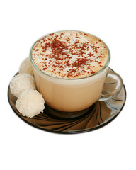 isolated cup of capuccino and coconut candies