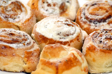 close-up walnut buns with powdered sugar