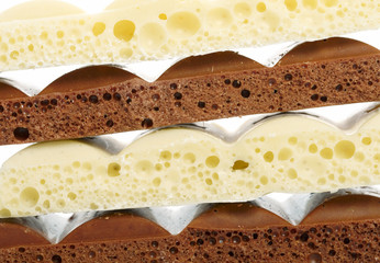 Stack of brown and white porous chocolate