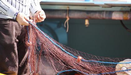 fisherman pulling net