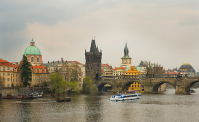 Obraz premium View of Prague with Charles bridge at overcast day