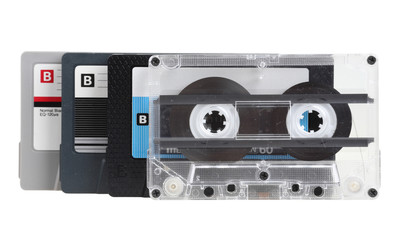 pile of old tapes isolated on white with clipping path