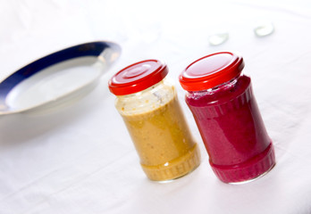 Two sauce in jars