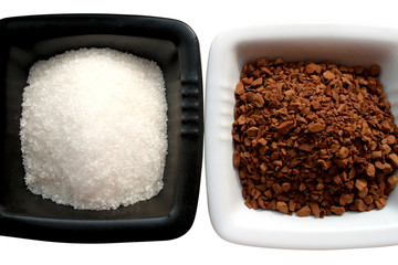 Isolated plates with sugar and natural coffee