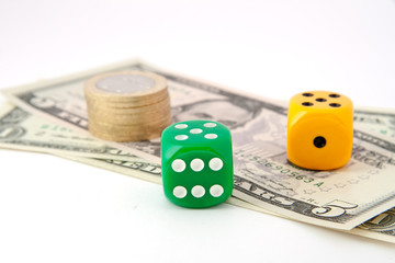 dice and dollars. isolated on a white background