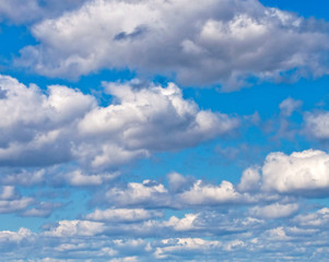 Fototapeta na wymiar Beatiful white clouds on the blue sky