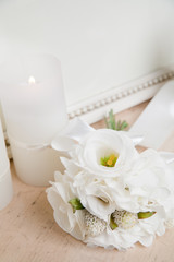 candle and white flower decoration