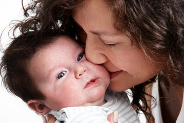 closeup portrait of happy mother with baby