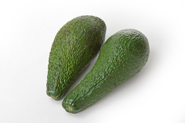 Green avocado isolated on white