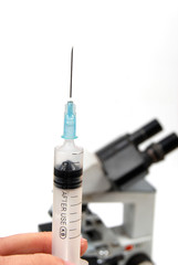 syringe and microscope