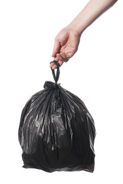 Black full trash bag ripped open and overflowing Vector Image