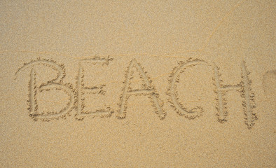 Beach escrito en la arena
