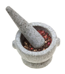 Mortar and pestle with crushed pepper isolated on white