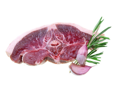 a slice of fresh raw saddle of lamb