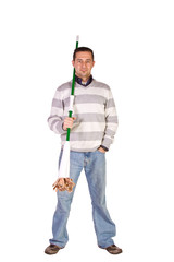 Casual Man Posing with a Sweeper