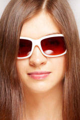 beautiful young girl with fashion sunglasses