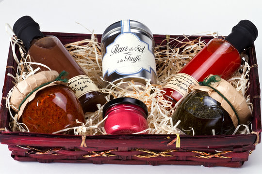 Gift basket with gourmet condiments and sauces.