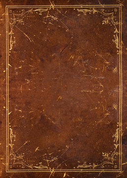 old leather background with golden floral decoration