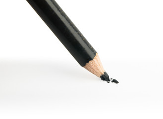 black pencil isolated in white background