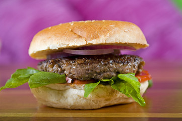 Beef burger with salad in a bread bun