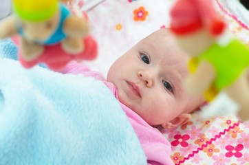 little girl in crib