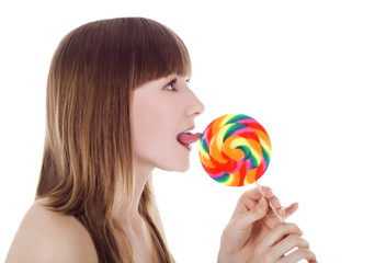 Bright picture of happy blonde with color lollipop