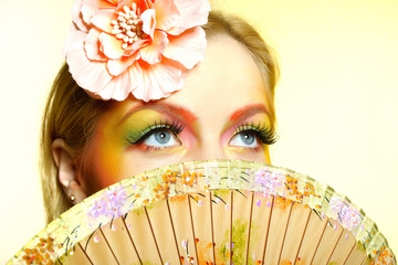 Close-up portrait of summer fashion creative eye make-up