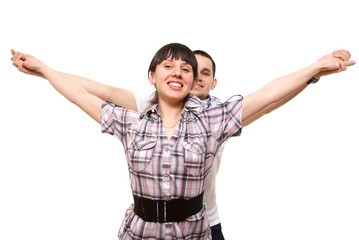 Young man and the woman stand and smile on a white background