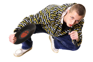 The young man with a plate and a microphone speaks