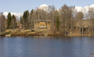 Fototapeta na wymiar House near the river