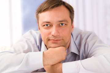 handsome young man sitting