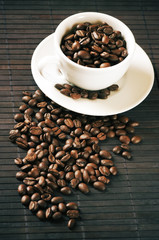 Coffee beans and cup