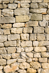 Fototapeta premium A wall built of stones.