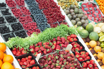 Various berries on market stall