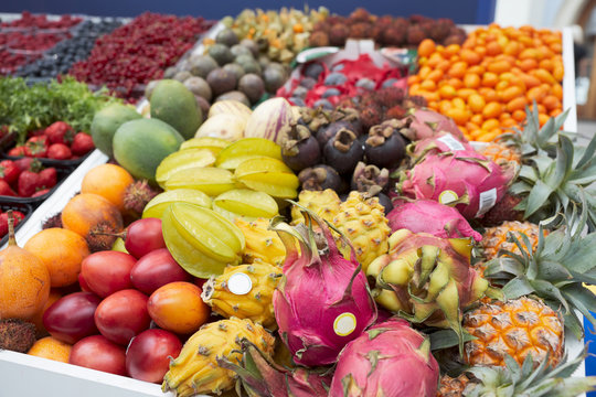 Various tropical fruits on market stall