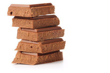 chocolate bars stacked, isolated on white