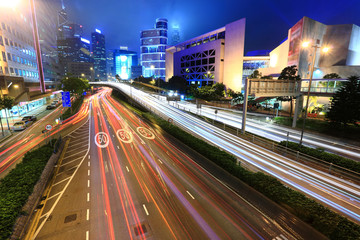 Fototapeta na wymiar traffic in business district at night.