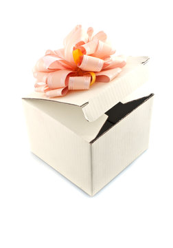 Gift box with rose-colored ribbon