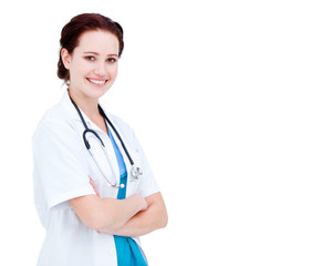 Fototapeta premium Portrait of a smiling female doctor with folded arms