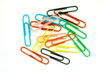 Fourteen paperclips, on white
