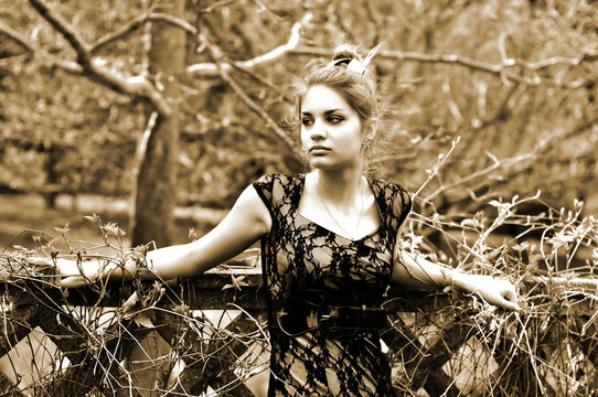 tree-bound girl in sepia