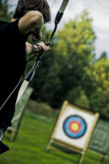 Boy Aiming with Bow