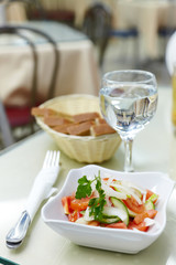 Salad from cafe in white ware