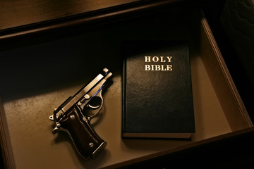 The Bible and a pistol