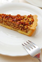 Hazel nut tart with fork