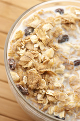 Muesli with milk close-up