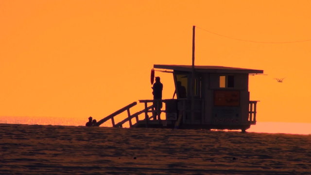 Lifeguard tower at sunset - HD